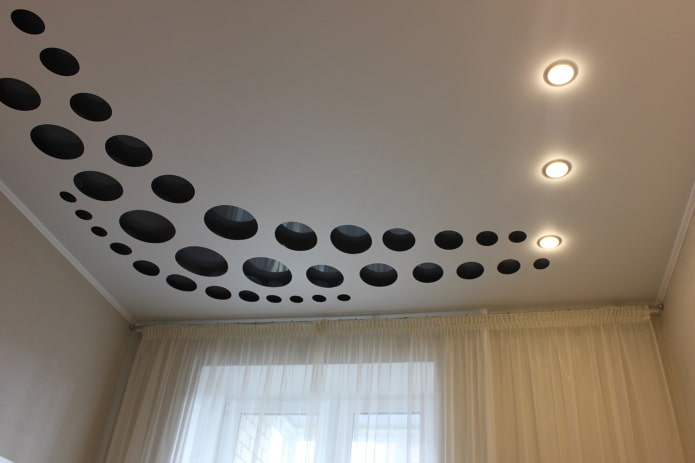 carved stretch canvas with spotlights