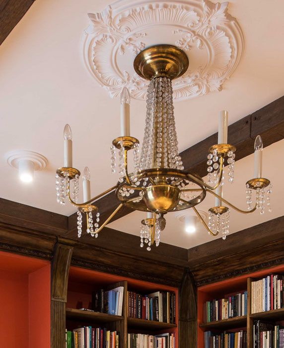 stucco decoration on the ceiling under the chandelier stucco decoration on the ceiling under the chandelier