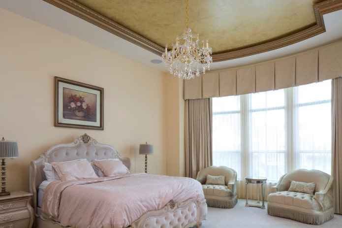 plaster on the ceiling in the interior of the bedroom plaster on the ceiling in the interior of the bedroom