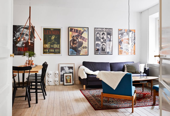 posters on the wall in the interior of the living room posters on the wall in the interior of the living room