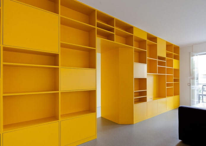 yellow wardrobe in the form of a partition in the interior yellow wardrobe in the form of a partition in the interior