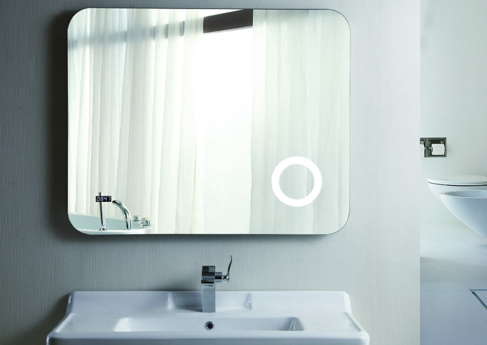 mirror with a clock in the interior of the bathroom mirror with a clock in the interior of the bathroom