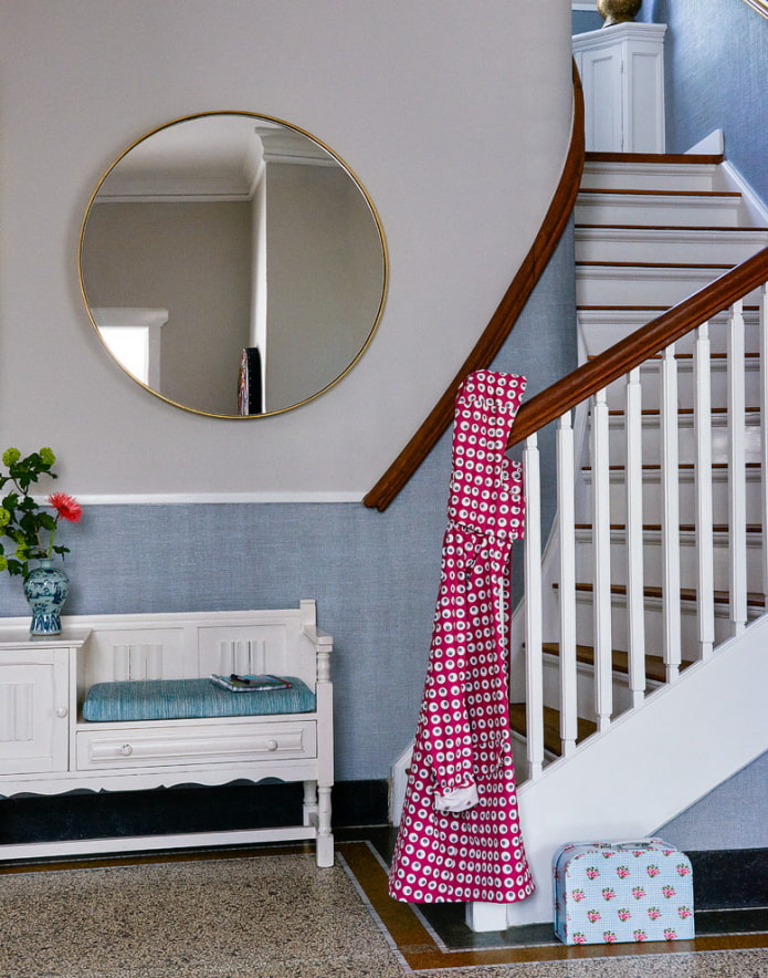 round mirror in the interior of the hallway round mirror in the interior of the hallway