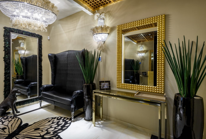 mirror in a golden frame in the interior of the hallway mirror in a golden frame in the interior of the hallway