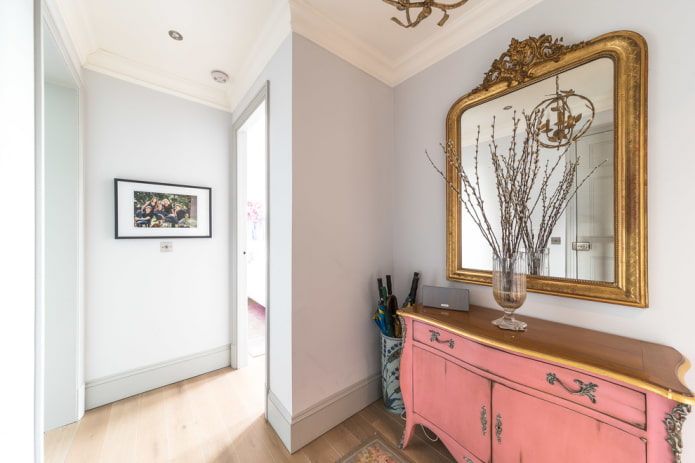 mirror in a baguette frame in the interior of the hallway mirror in a baguette frame in the interior of the hallway