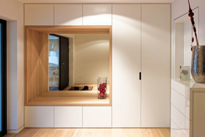 mirror in a niche in the interior of the hallway mirror in a niche in the interior of the hallway