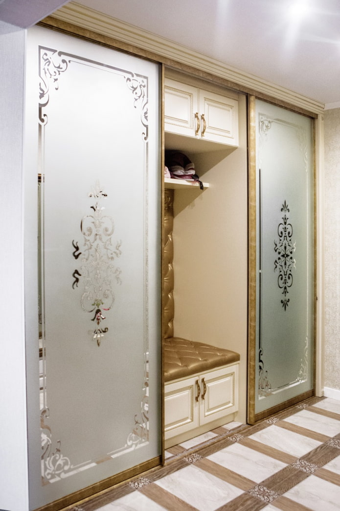 mirror with sandblasted patterns in the interior of the hallway mirror with sandblasted patterns in the interior of the hallway