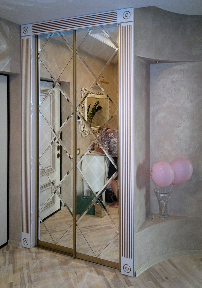 beveled mirror built into the wardrobe in the interior beveled mirror built into the wardrobe in the interior