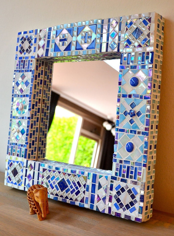 mirror in a mosaic frame in the interior