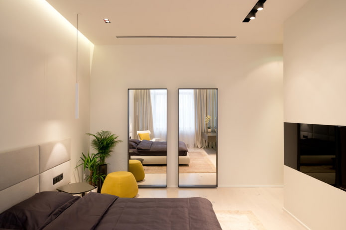 mirror opposite the window in the interior of the bedroom mirror opposite the window in the interior of the bedroom