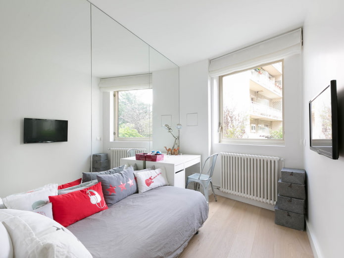 full-wall mirror in the interior of the bedroom full-wall mirror in the interior of the bedroom