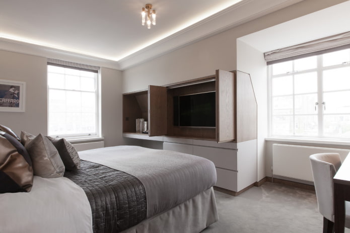 TV built into the wardrobe in the bedroom interior TV built into the wardrobe in the bedroom interior