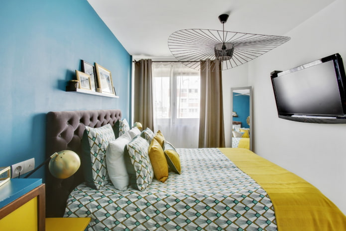 TV in the interior of a small bedroom TV in the interior of a small bedroom