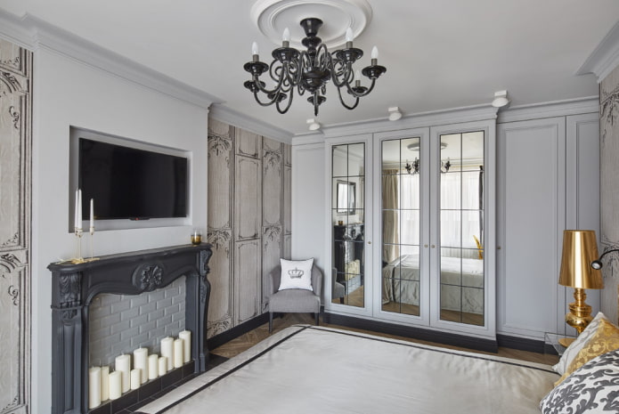 TV panel above the fireplace in the interior of the bedroom TV panel above the fireplace in the interior of the bedroom