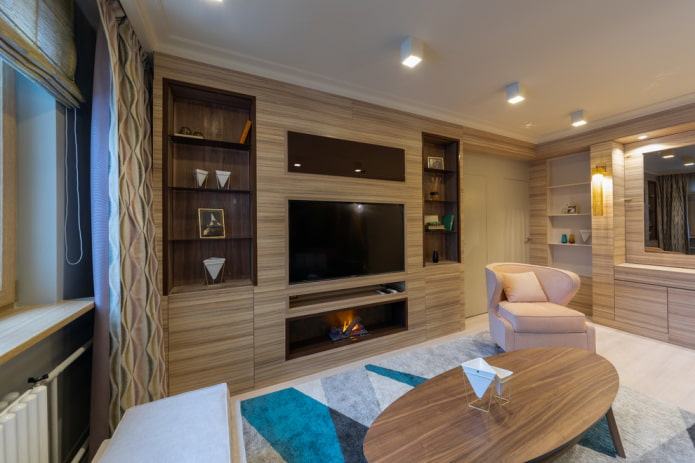 fireplace with TV built into the wardrobe in the living room fireplace with TV built into the wardrobe in the living room