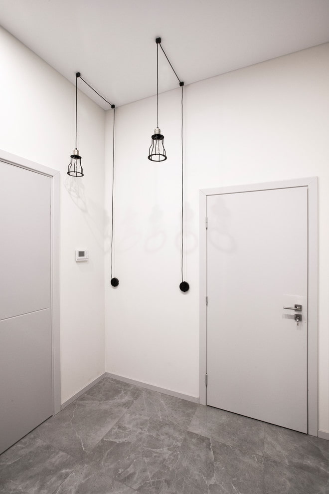 gray doors in the interior of the hallway