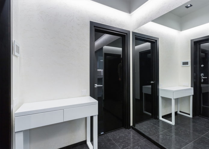 black doors in the interior of the hallway