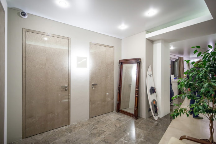 beige doors in the interior of the hallway
