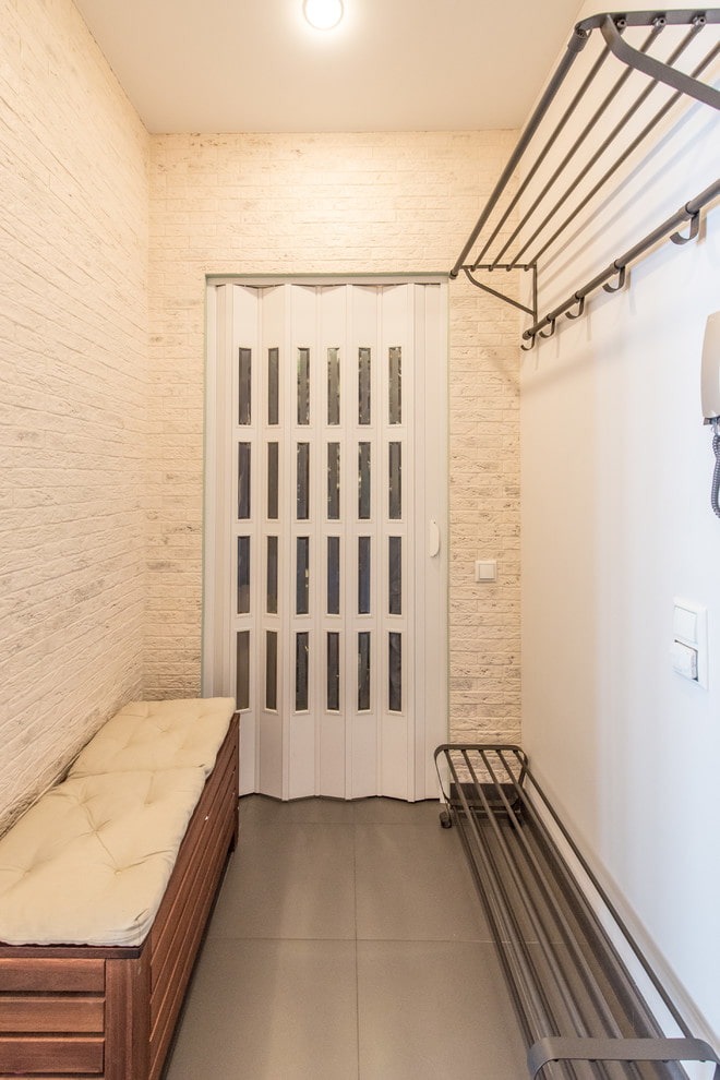 accordion door in the interior of the hallway