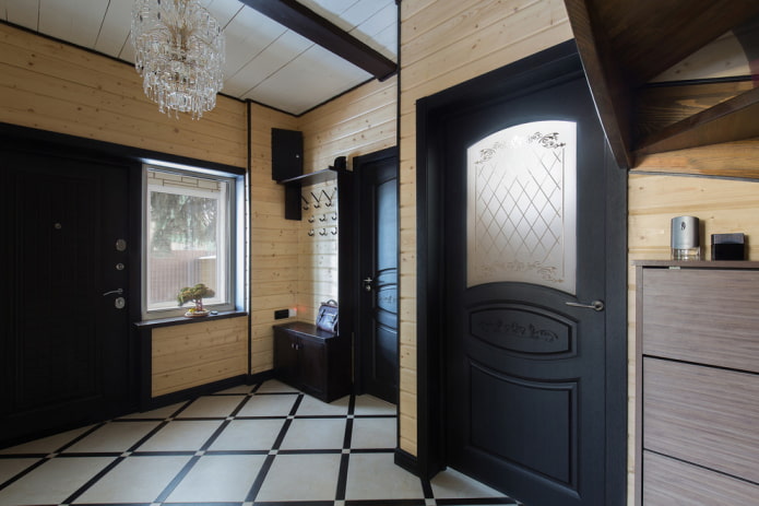 black doors in the interior of the hallway