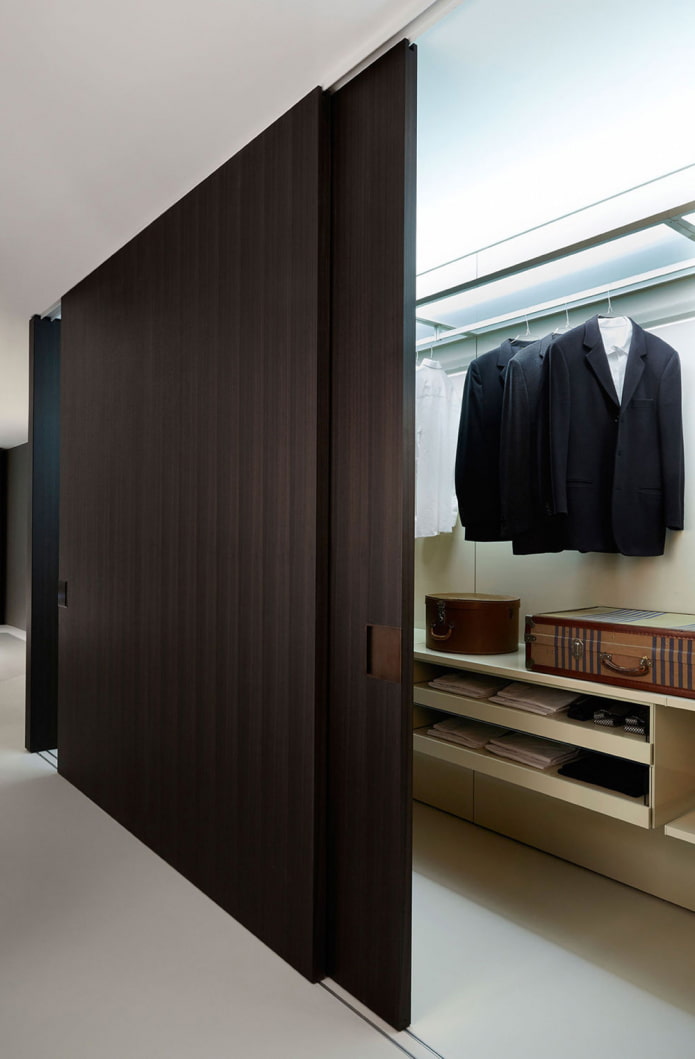 dressing room with wooden doors in the interior dressing room with wooden doors in the interior