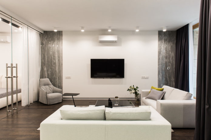 wall-mounted TV in the interior in a modern style