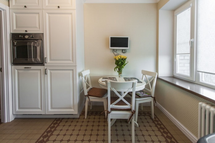 small wall TV in the interior of the kitchen