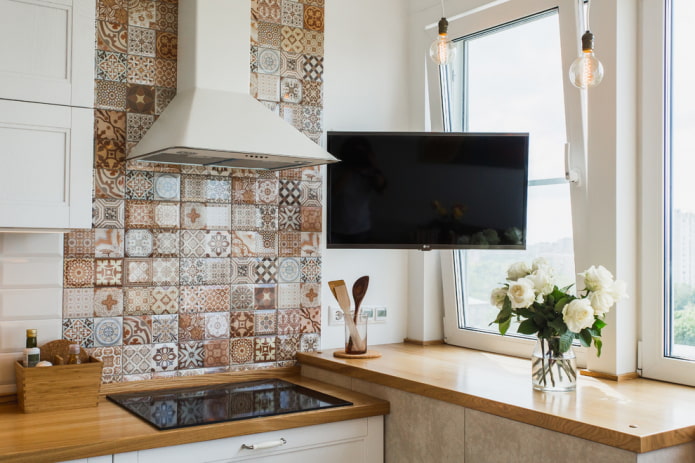 wall TV in the interior of the kitchen