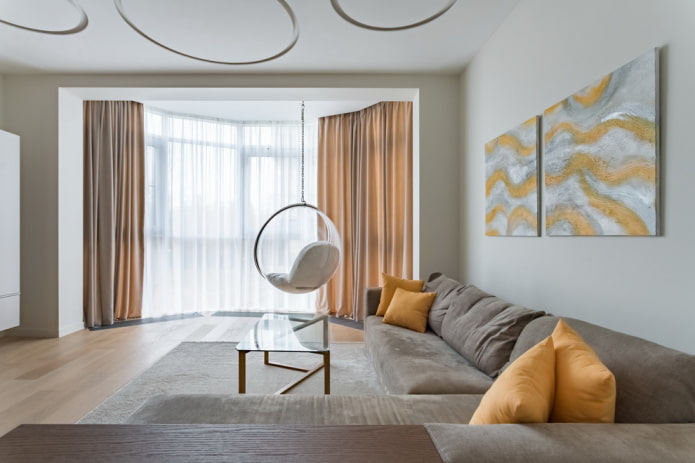 arch in the interior of the living room with a bay window arch in the interior of the living room with a bay window