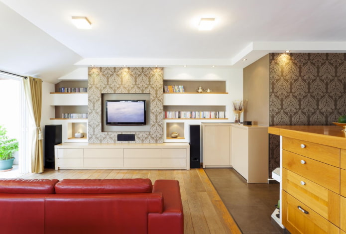 TV in a niche covered with wallpaper in the interior