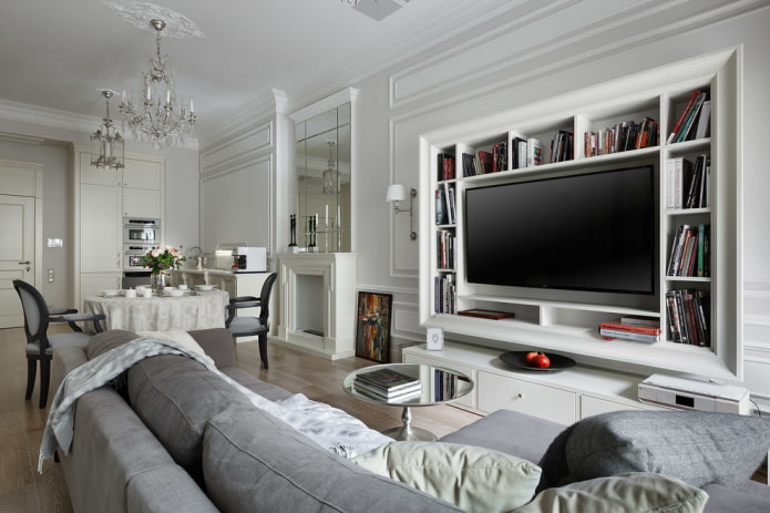 TV in a niche with shelves in the interior