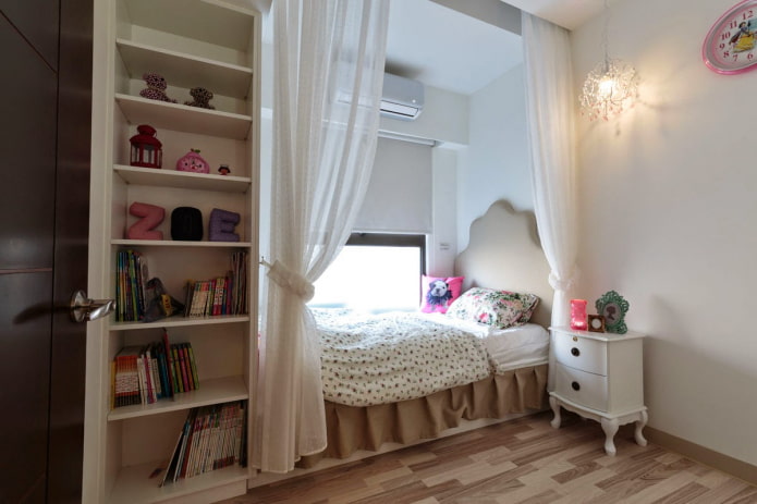 niche with a bed in the interior of the nursery niche with a bed in the interior of the nursery