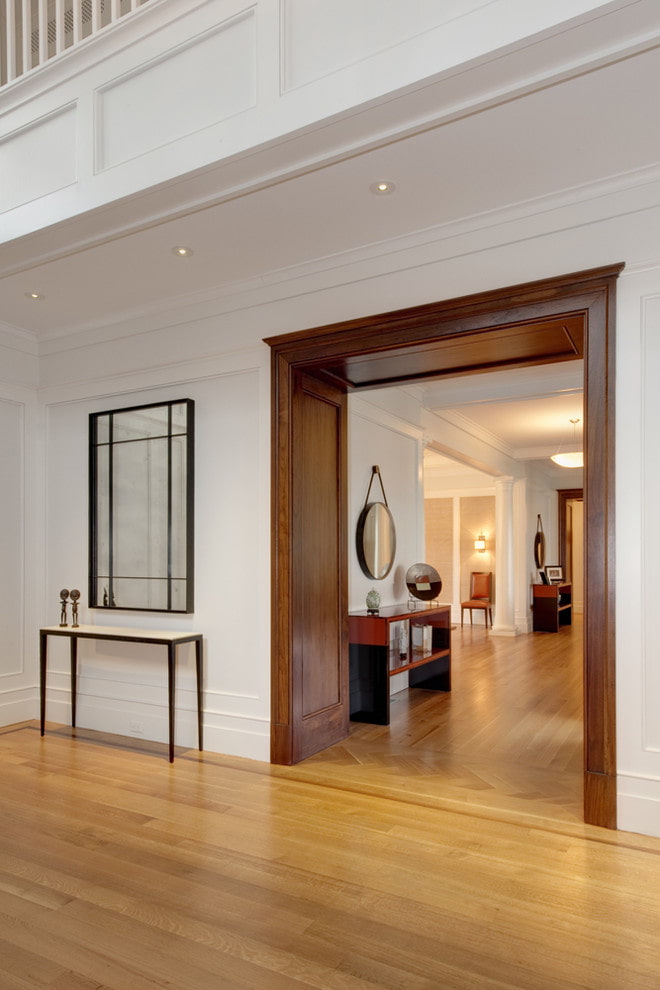 doorway with trim platbands and extrusions