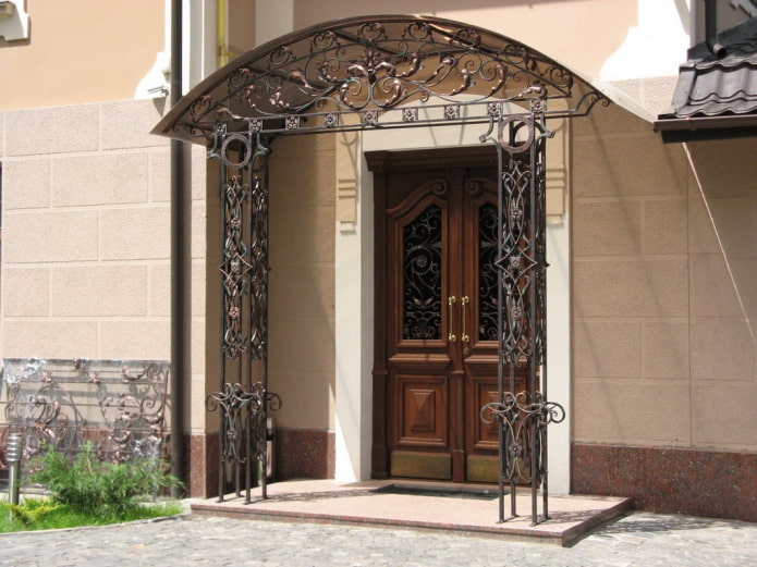 porch with a wrought-iron canopy porch with a wrought-iron canopy