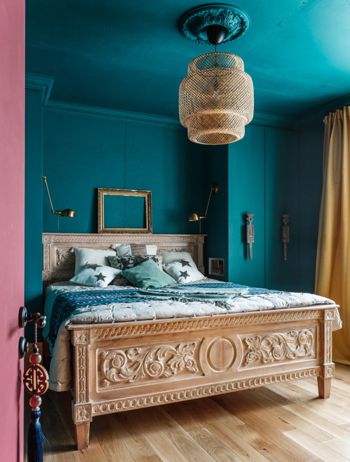 wooden bed with carved headboards in the interior wooden bed with carved headboards in the interior