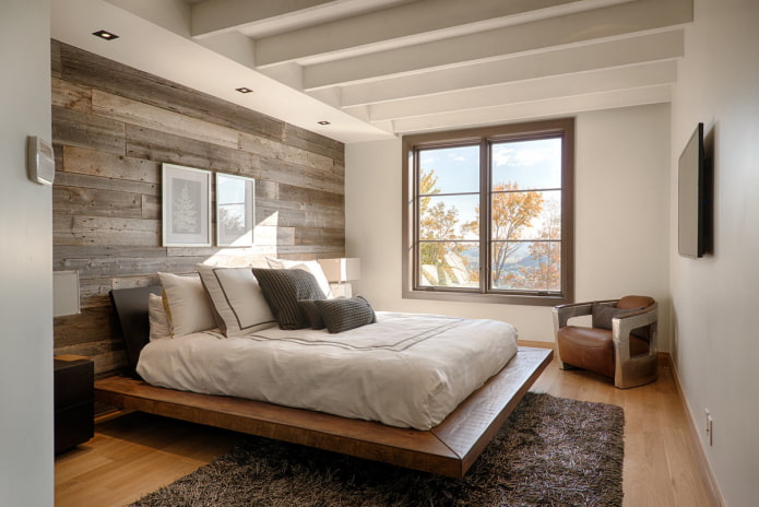 low wooden bed in the interior low wooden bed in the interior