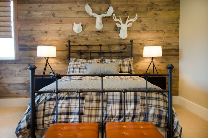 bed with a wrought-iron headboard in the interior