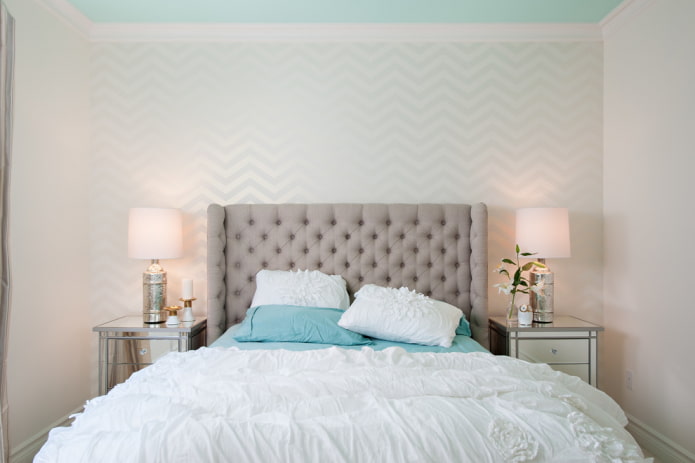 bed with a rectangular headboard in the interior bed with a rectangular headboard in the interior