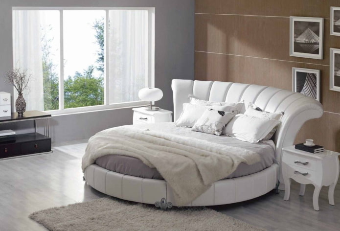 bed with a curved headboard in the interior bed with a curved headboard in the interior