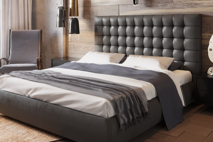 bed with a quilted headboard in the interior bed with a quilted headboard in the interior