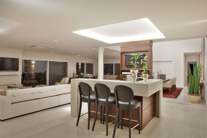 bar counter in the center of the living room
