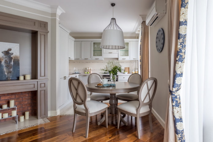 round gray table in the interior of the kitchen round gray table in the interior of the kitchen