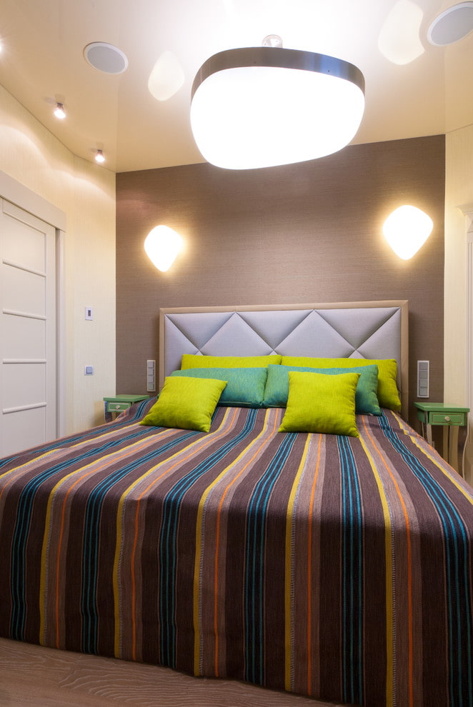 semi-double bed with a bedspread in the interior