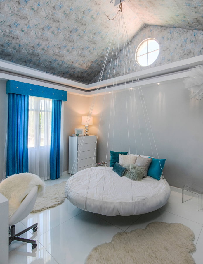 round bed on a suspension in the interior