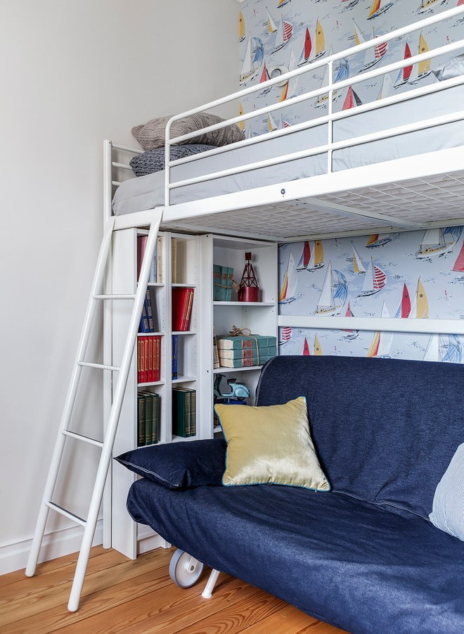 bed with stairs in the interior of the nursery
