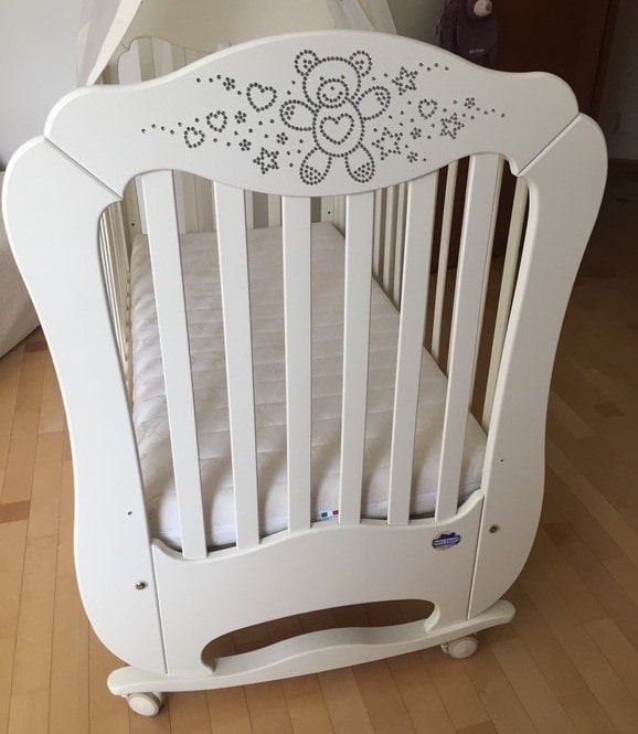 baby bed decorated with rhinestones