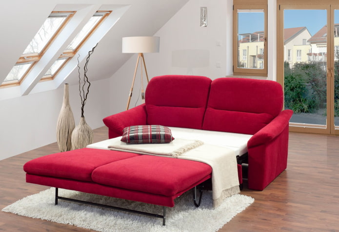 red folding sofa in the interior red folding sofa in the interior