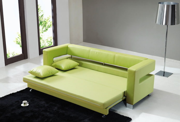 green folding sofa in the interior green folding sofa in the interior