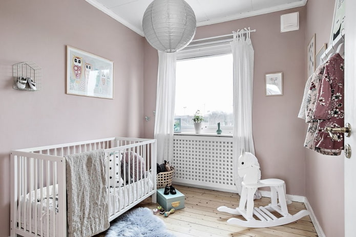 nursery for a newborn in soft lilac color nursery for a newborn in soft lilac color