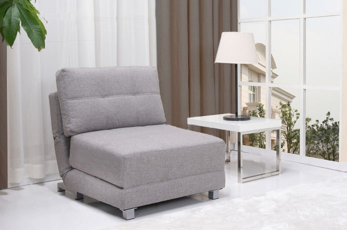 gray folding armchair in the interior